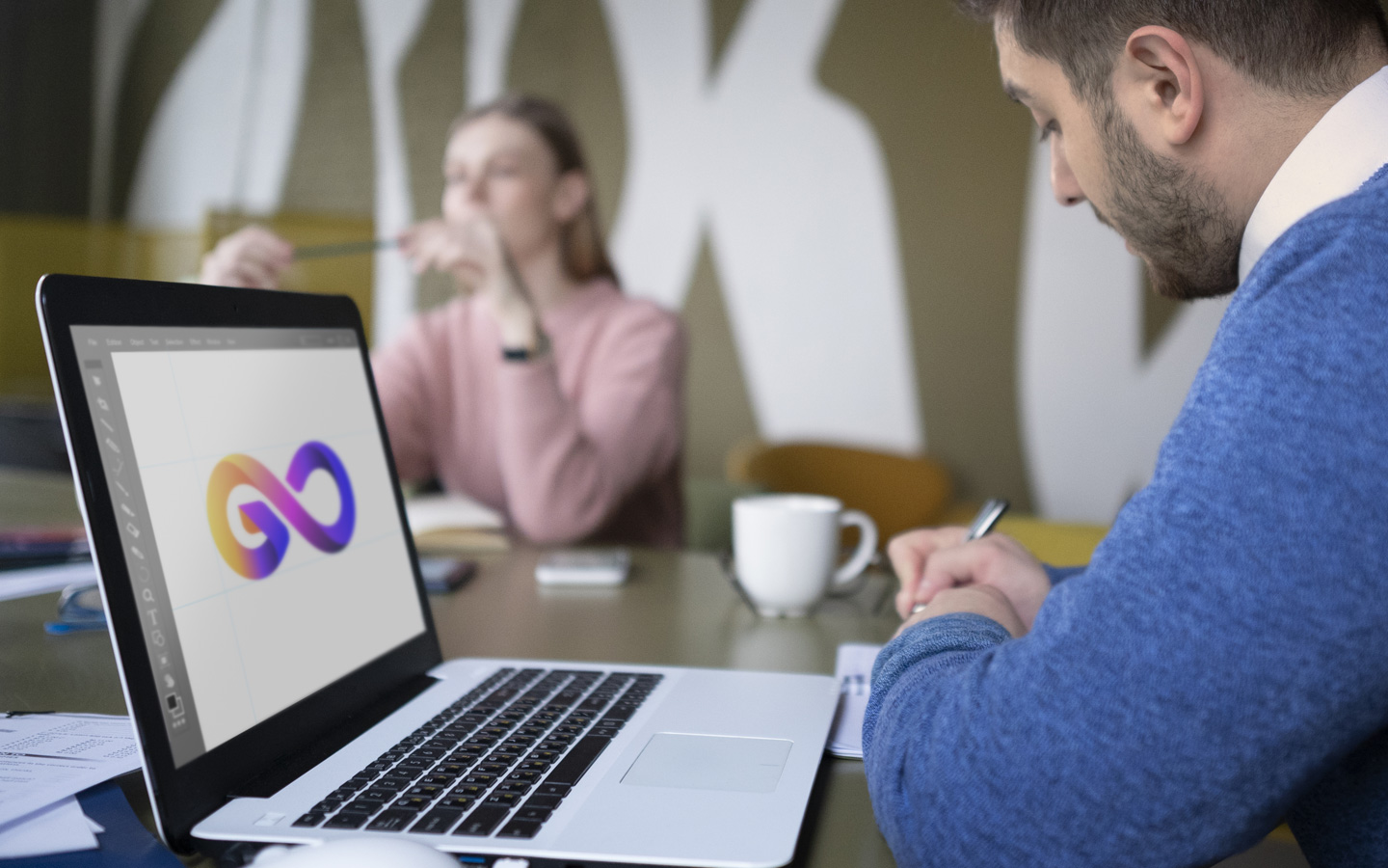 Graphic Designer working on logo